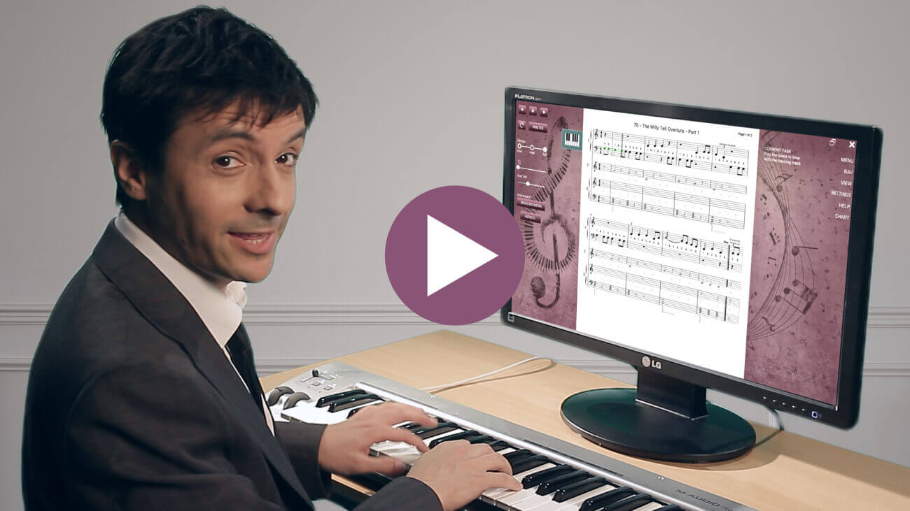 Celebrity pianist, John Foreman, playing a MIDI keyboard while interacting with the Musiah piano lessons app on a computer monitor. Click to view this Musiah video demo.